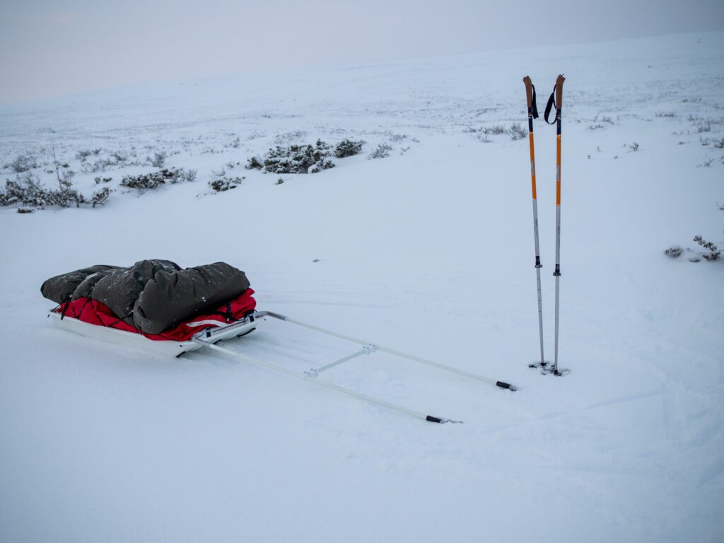 Sovsäcksöverdrag som arctic bedding på pulka från Jemtlander